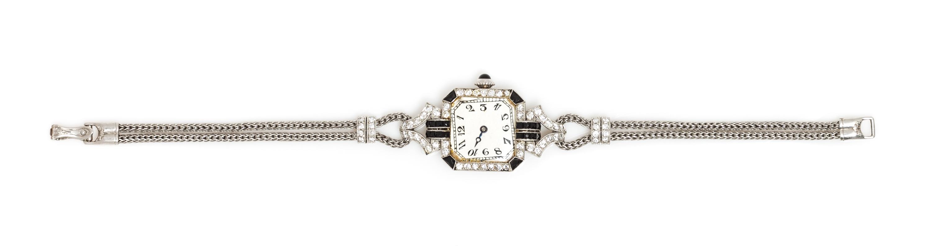 An Art Deco Platinum, Diamond and Onyx Wristwatch, C.H. Meylan for Henry Blank & Co., 18.00 dwts.