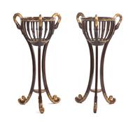 A Pair of Empire Mahogany and Parcel Gilt Jardinieres on Stands, Height 48 inches.