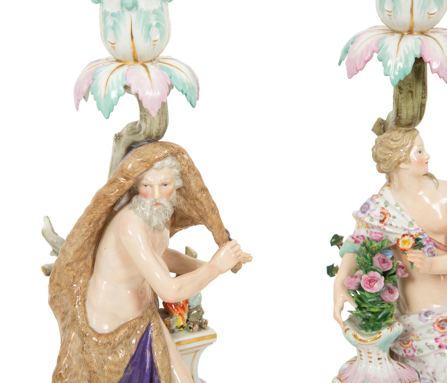 A Set of Meissen Porcelain Four Seasons Candlesticks