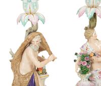 A Set of Meissen Porcelain Four Seasons Candlesticks