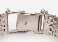 A Ladies 14K White Gold Movado Watch with Diamonds