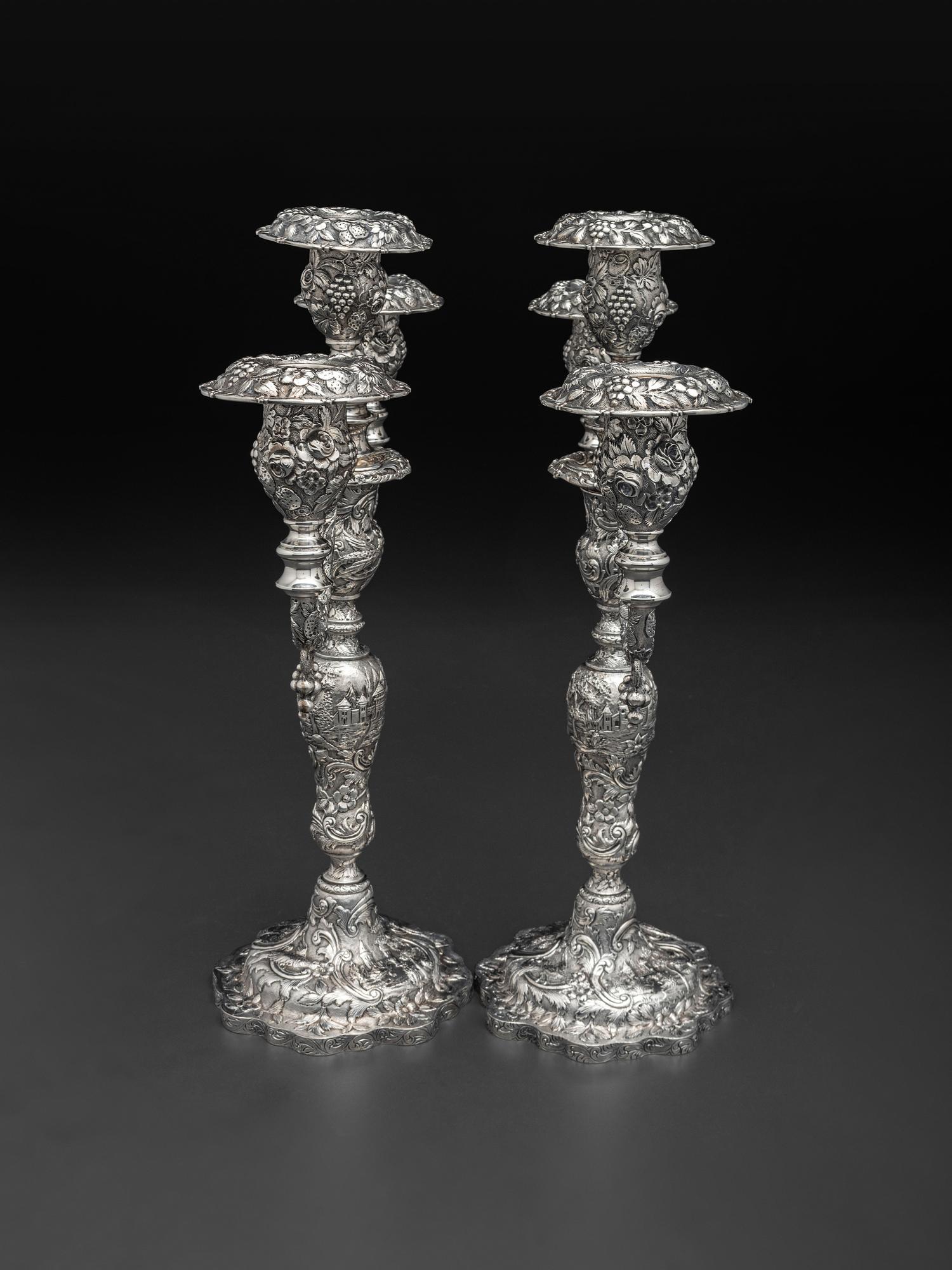 A Pair of American Repousse Silver Candelabra