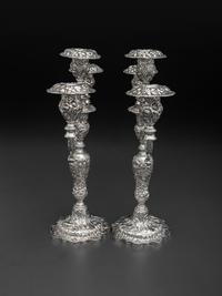 A Pair of American Repousse Silver Candelabra