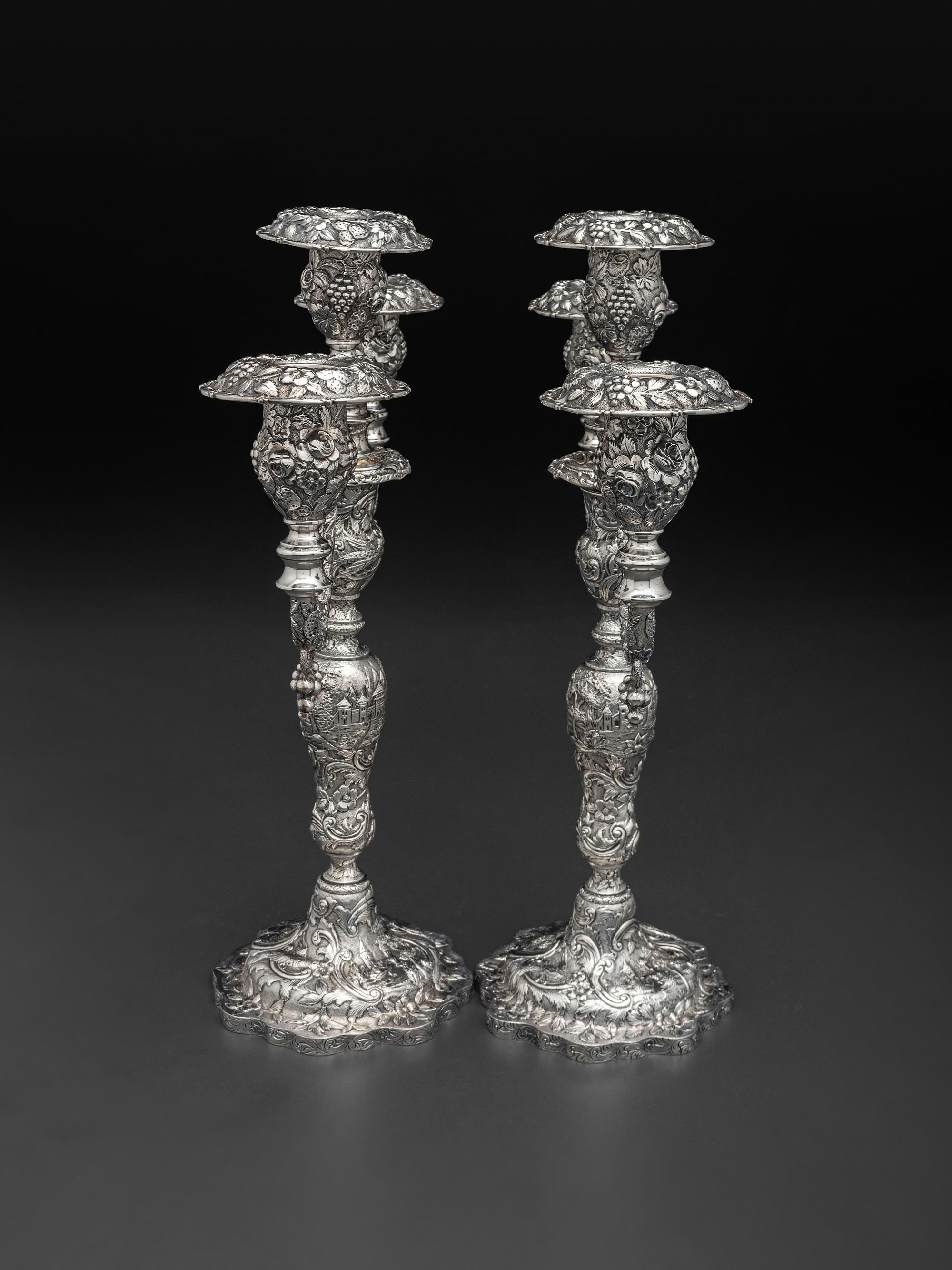 A Pair of American Repousse Silver Candelabra