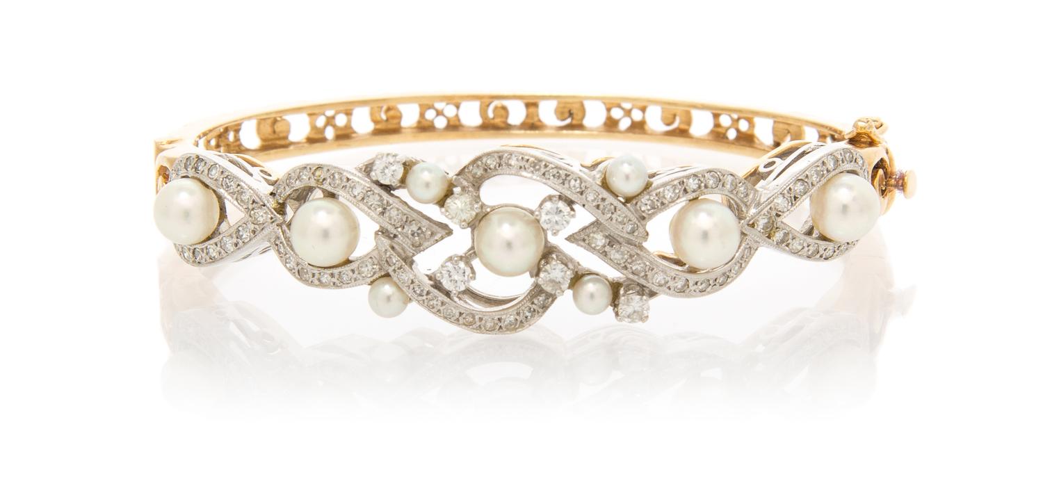 A Gold, Diamond and Cultured Pearl Bangle Bracelet, 16.20 dwts.