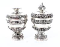 Two Silvered Metal Covered Cups on Stands, , each with alternating bands of scrolling decoration, each in a fitted box.