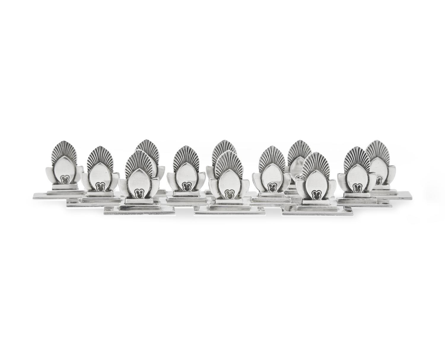 A Set of Twelve Gundorph Albertus Georg Jensen Silver Cactus Pattern Place Card Holders