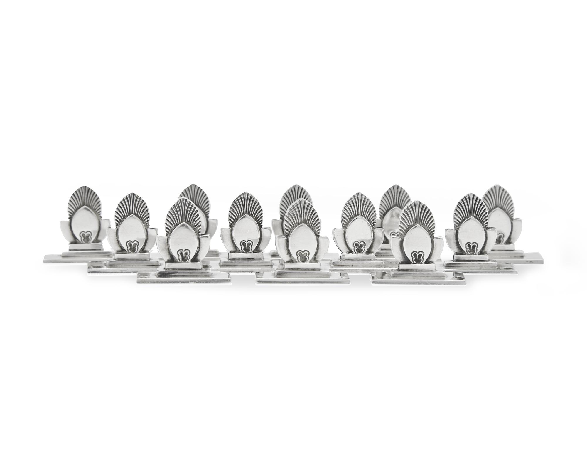 A Set of Twelve Gundorph Albertus Georg Jensen Silver Cactus Pattern Place Card Holders