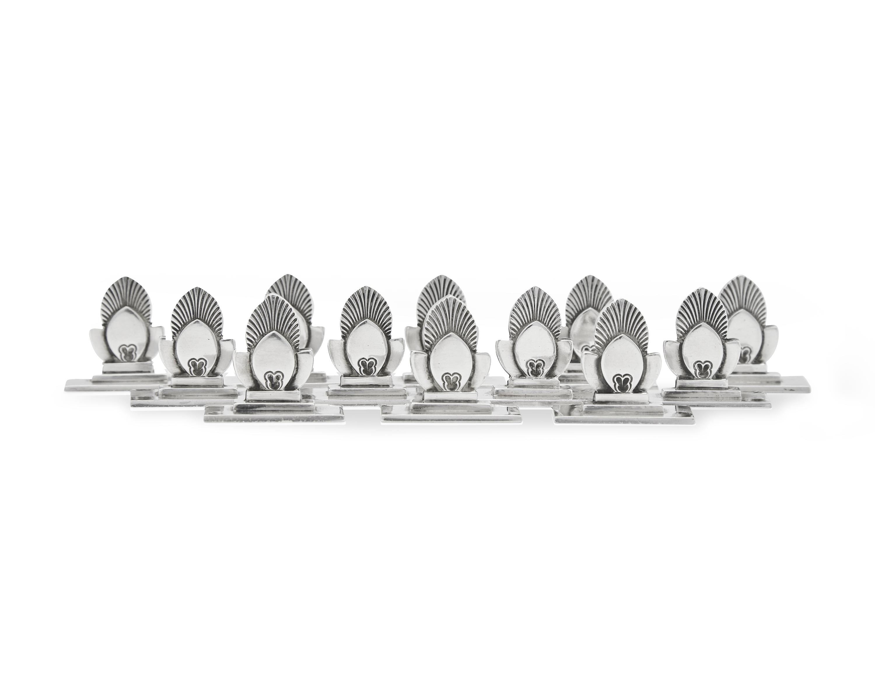 A Set of Twelve Gundorph Albertus Georg Jensen Silver Cactus Pattern Place Card Holders