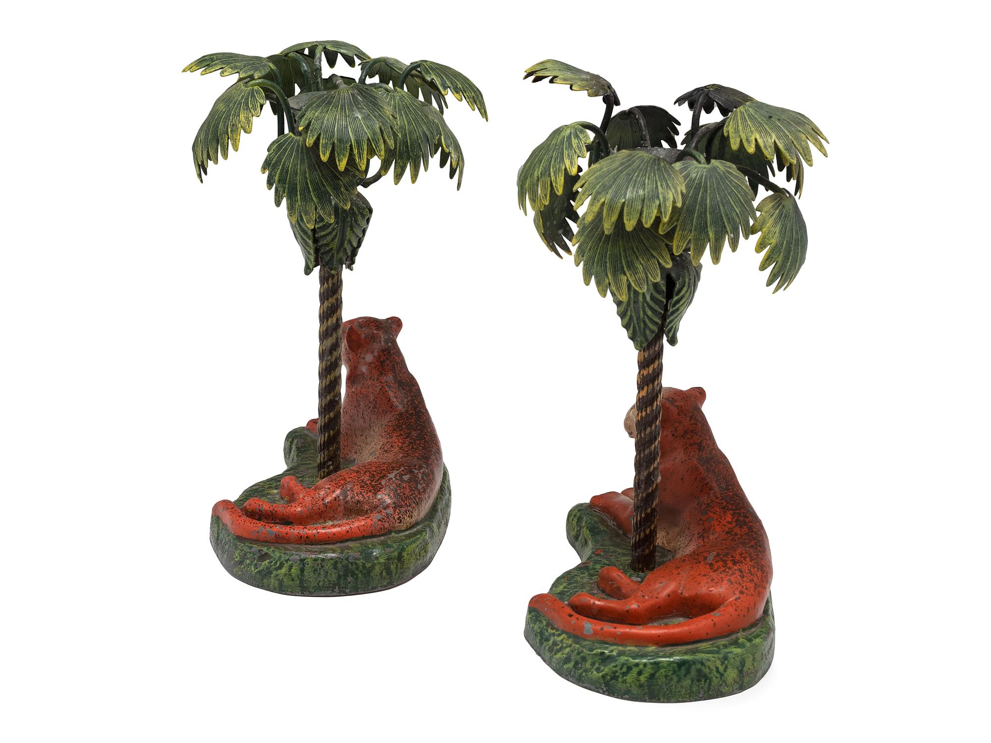 A Pair of Cold Painted Bronze Lion Candlesticks
