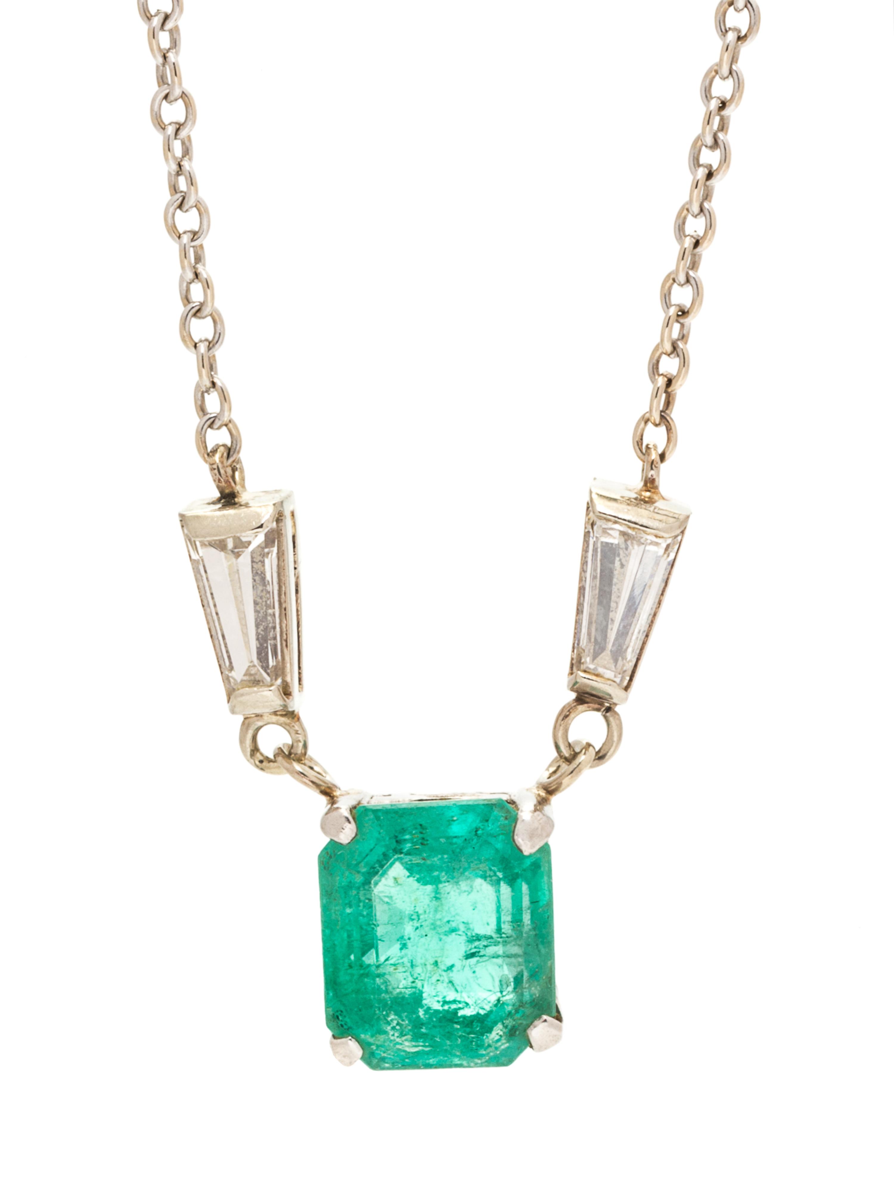 A 14 Karat White Gold, Emerald and Diamond Necklace, 3.10 dwts.