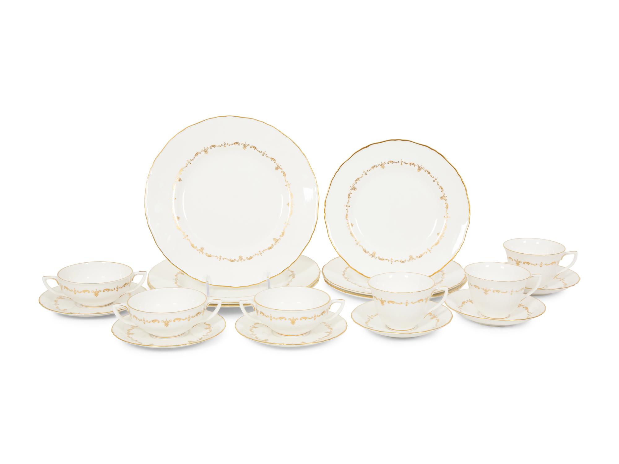 A Royal Worcester Gold Chantilly Porcelain Dinner Service