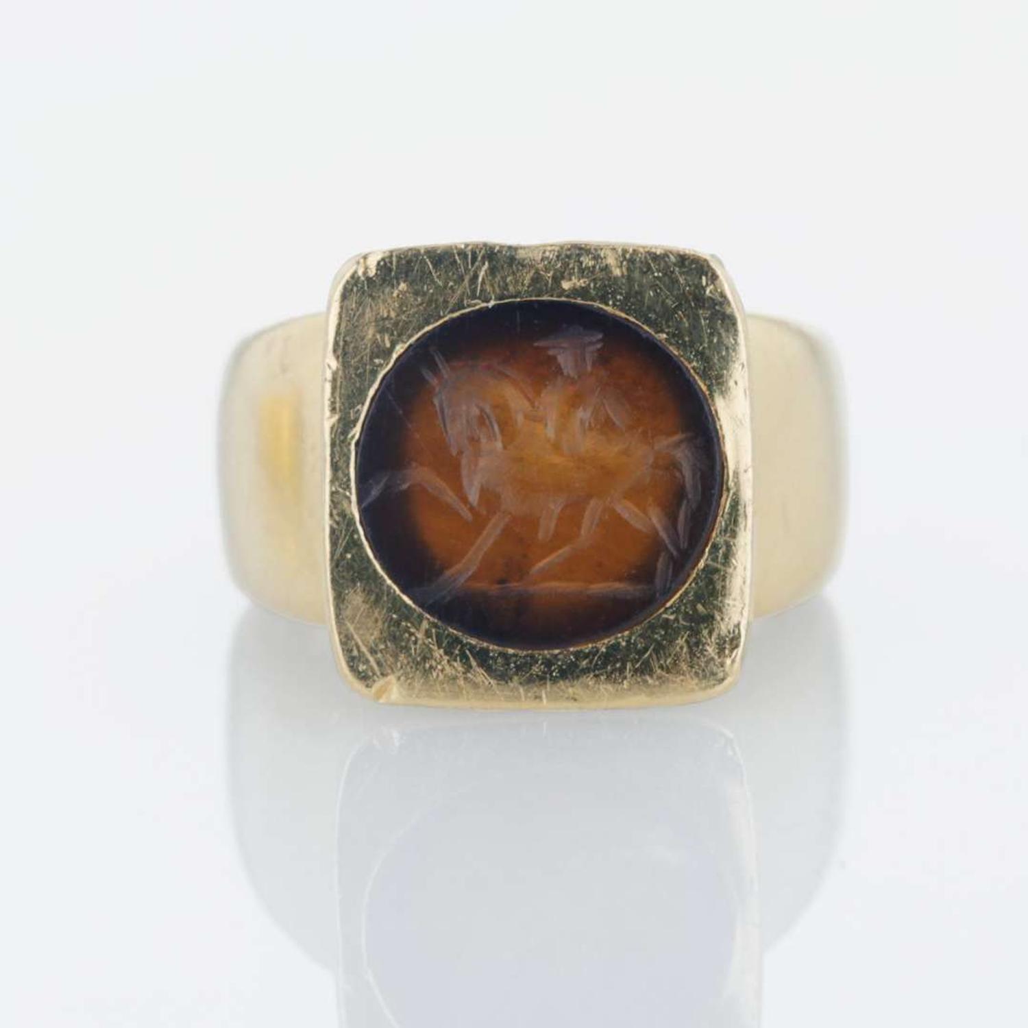 Two 18K yellow gold lady's gemstone rings