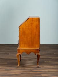 A Diminutive Queen Anne Style Tiger Maple Desk on Stand