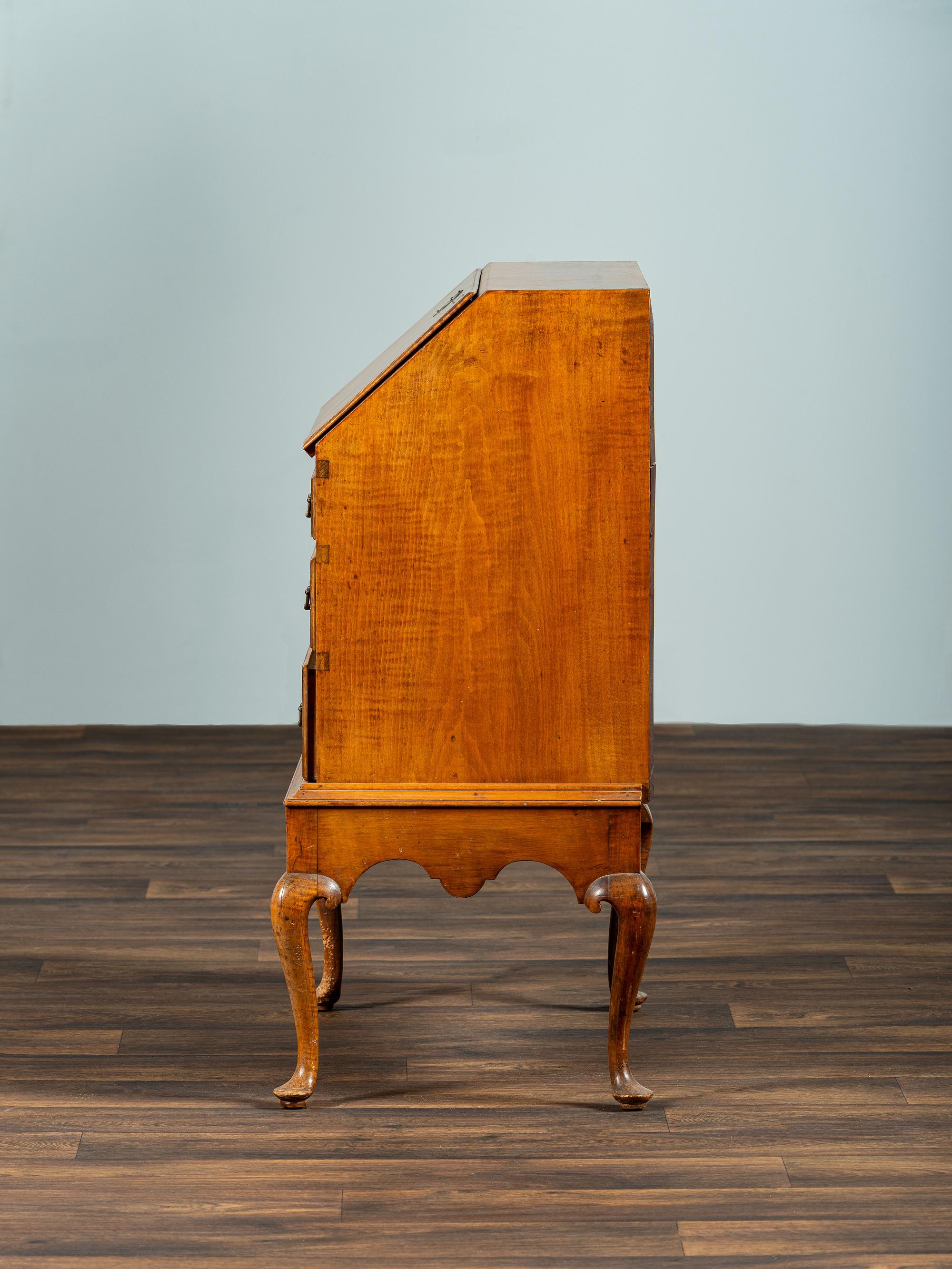 A Diminutive Queen Anne Style Tiger Maple Desk on Stand