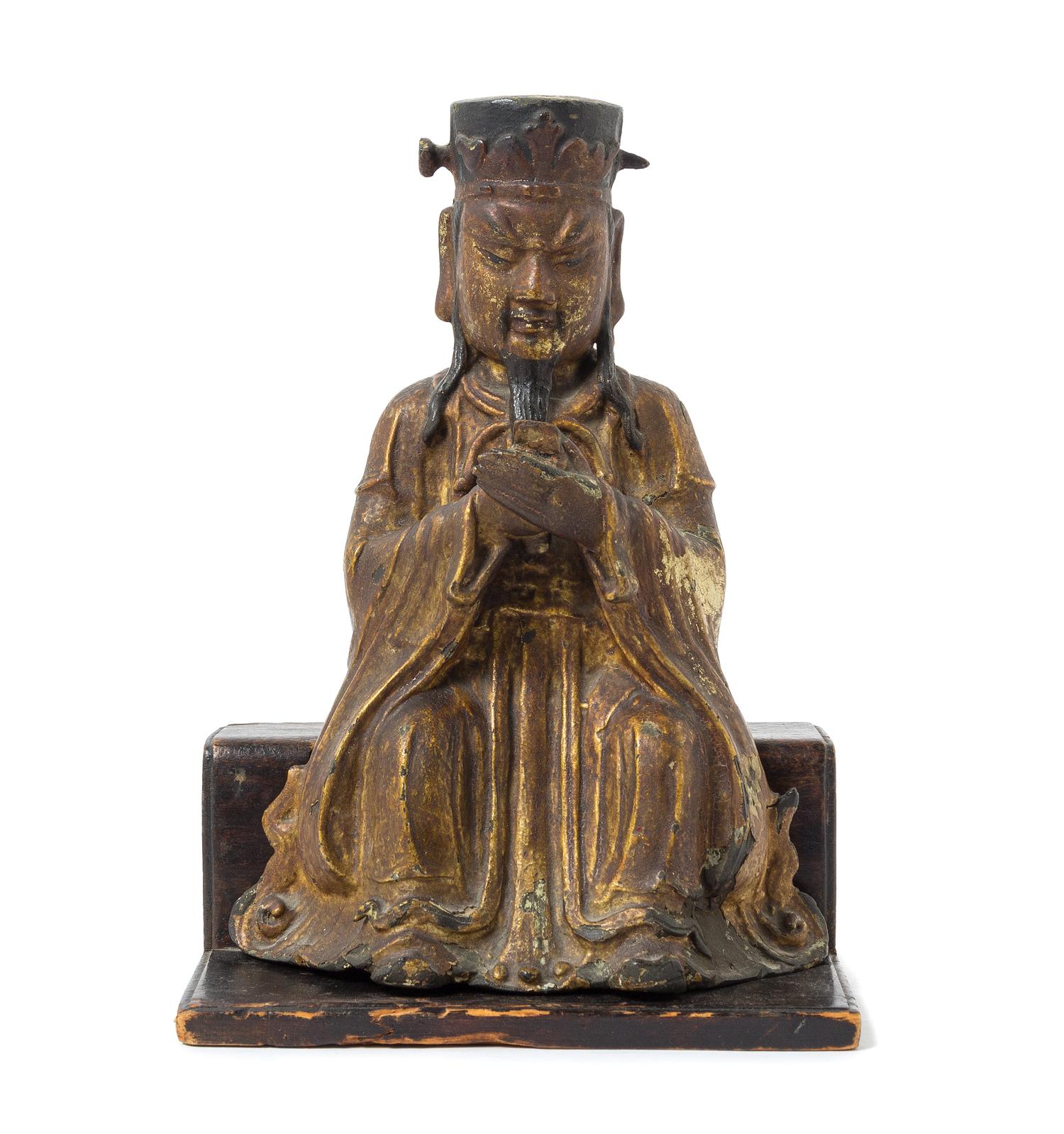 A Chinese Bronze Figure of a Seated Daoist Immortal MING DYNASTY Height overall 11 inches. — MING DYNASTY