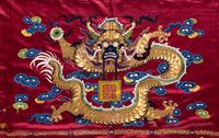 An Impressively Large Chinese Burgundy Ground Embroidered Silk 'Birthday' Wall Panel, Dated 1868 清同治七年（1868） 絳紅緞綉賀壽圖大挂屏