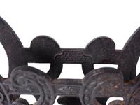 A Cast Iron Lyre Form Music Stand