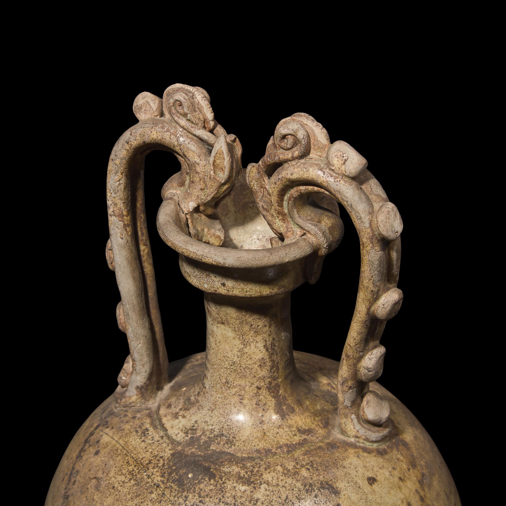 A Chinese Straw Glazed Handled Amphora Vase, Tang Dynasty 唐 綠釉雙龍首瓶