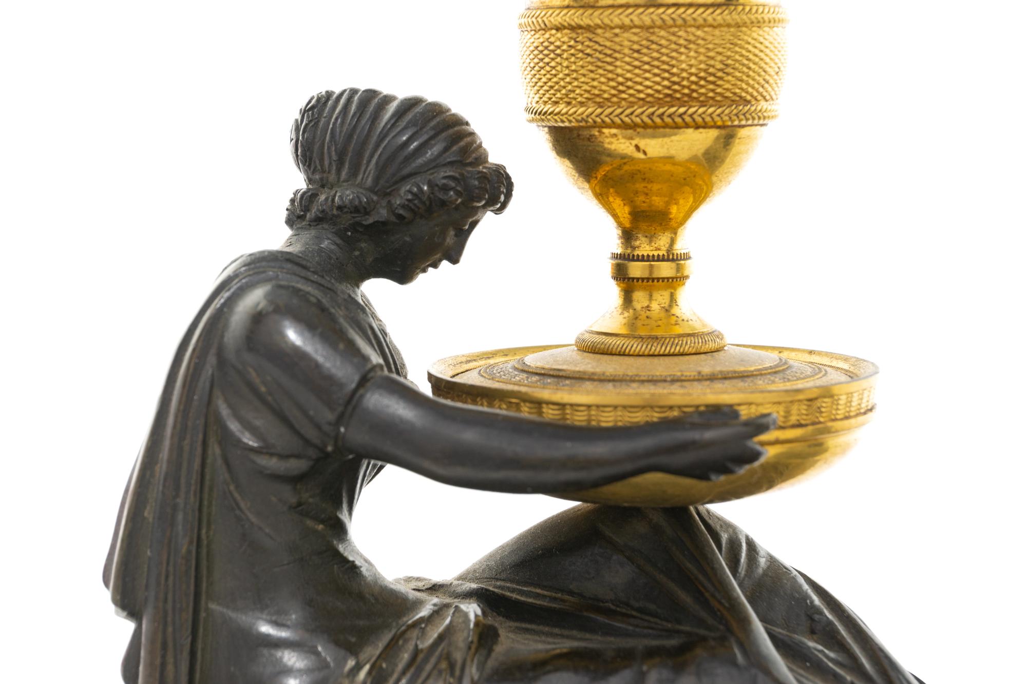 A Pair of Directoire Bronze and Marble Figural Candlesticks