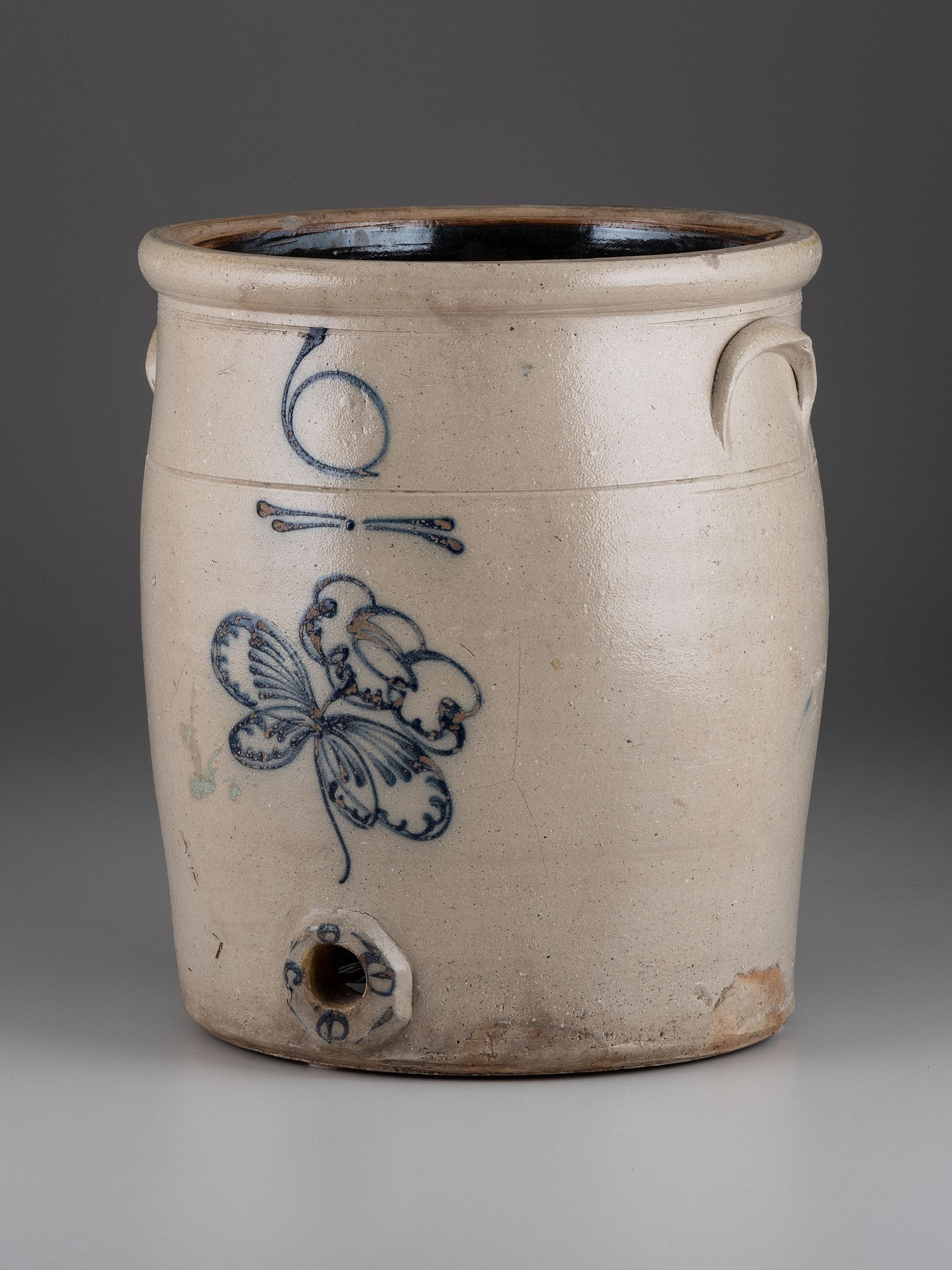 A Six-Gallon Cobalt Decorated Stoneware Water Cooler
