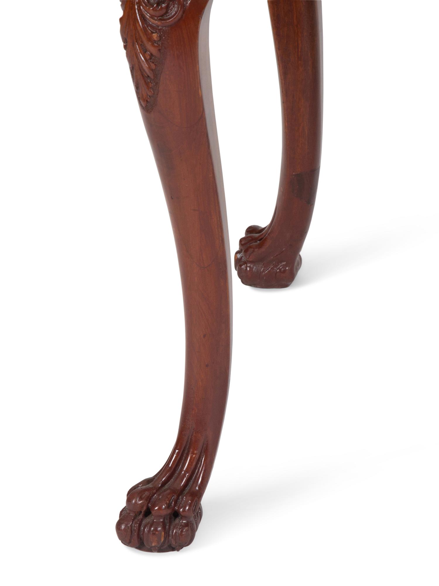 A Georgian Style Carved Mahogany Writing Table