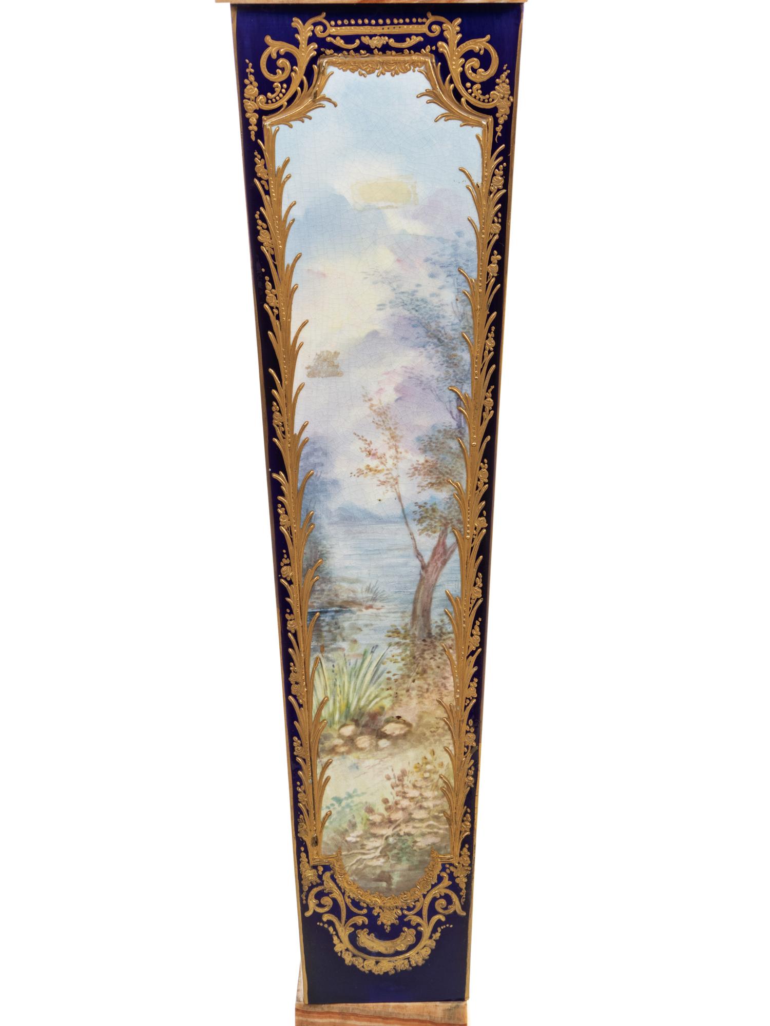 A Pair of Sèvres Style Gilt Bronze Mounted Painted and Parcel Gilt Porcelain and Onyx Pedestals