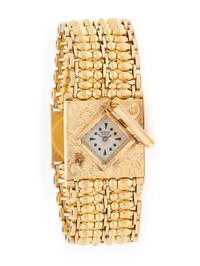 14K YELLOW GOLD SURPRISE WATCH