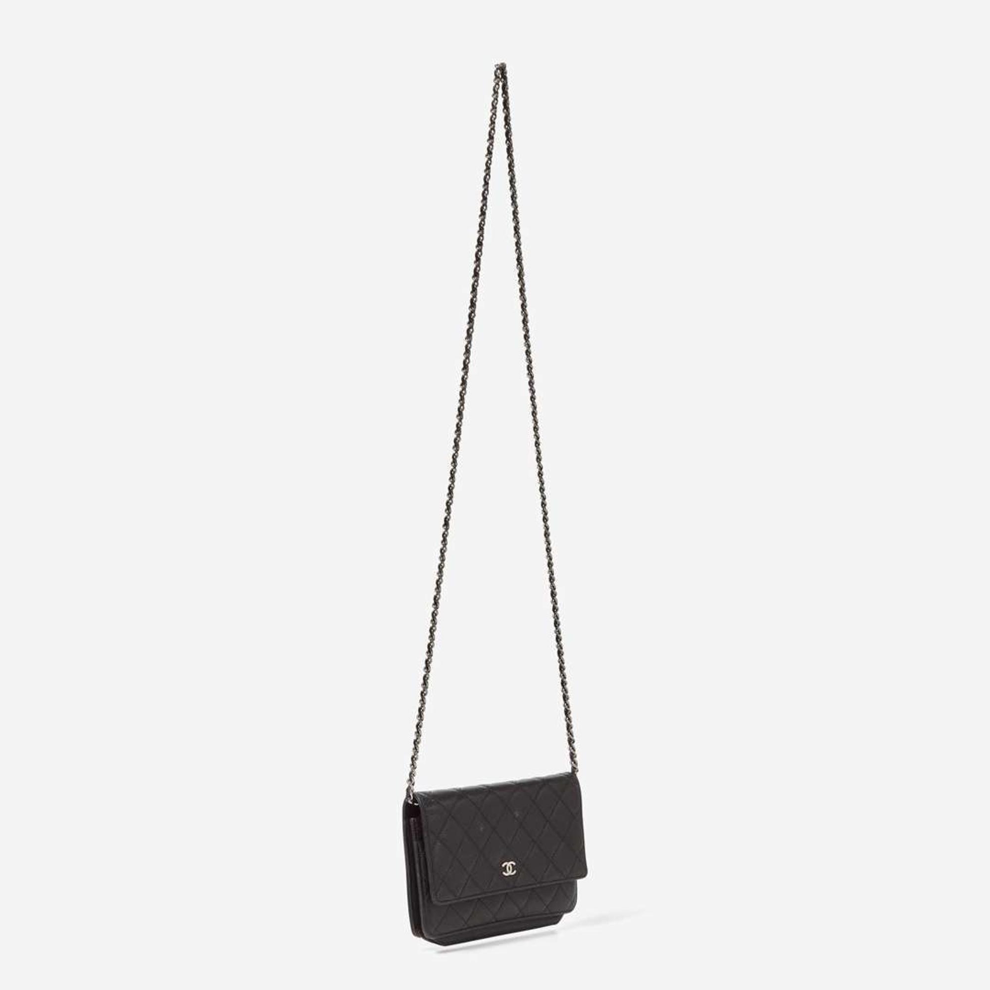 A Chanel Black Quilted Crossbody Purse Chanel