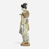 A Japanese enameled Satsuma-type pottery figure of a bijin, Kinkozan studios late 19th/early 20th Century