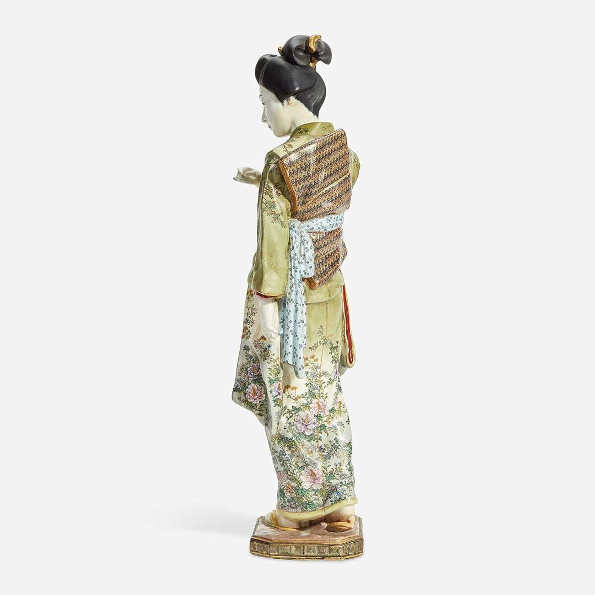 A Japanese enameled Satsuma-type pottery figure of a bijin, Kinkozan studios late 19th/early 20th Century