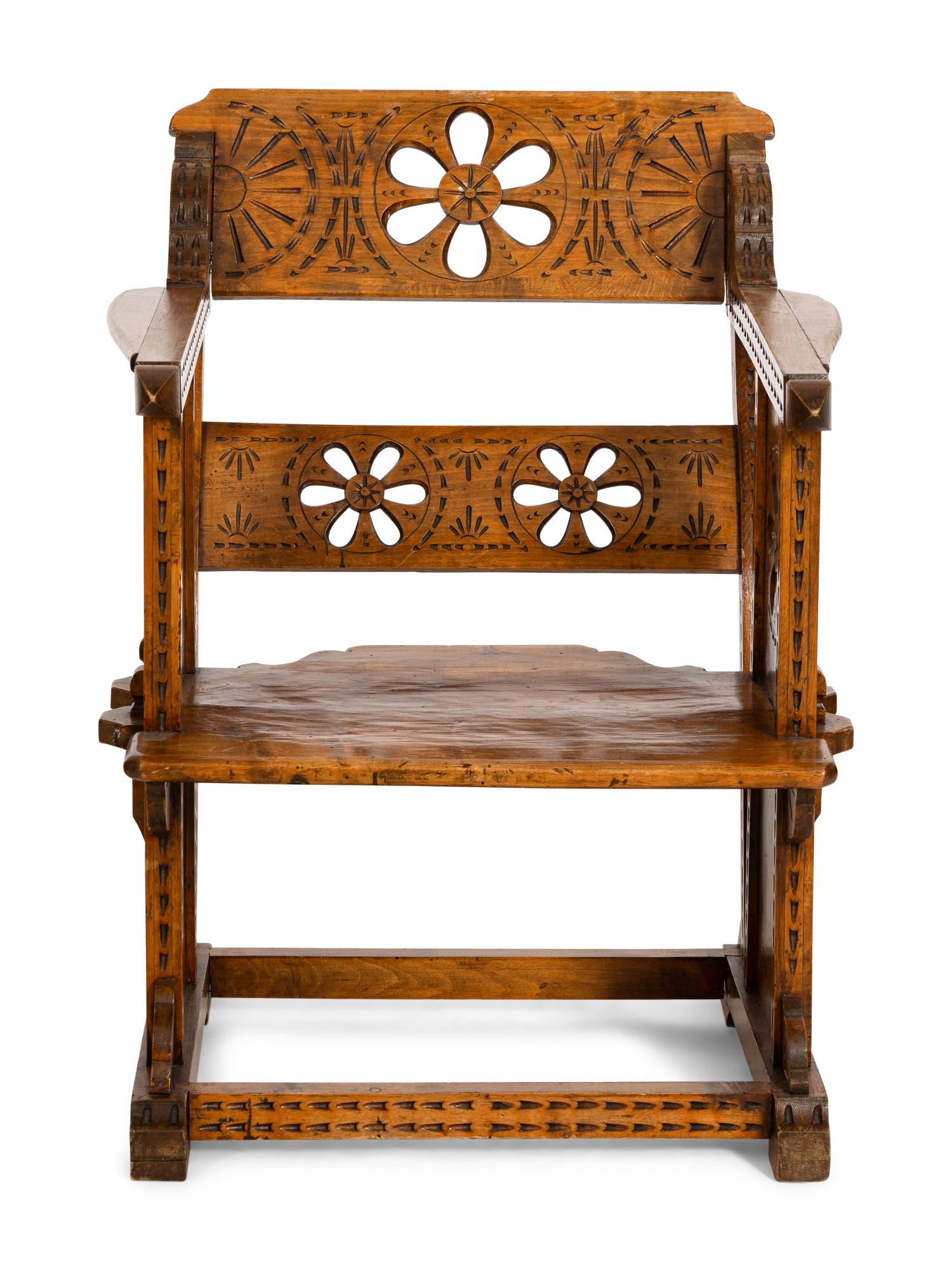 An Italian Pierce Carved Walnut Armchair