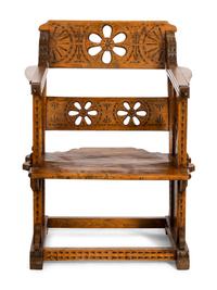 An Italian Pierce Carved Walnut Armchair
