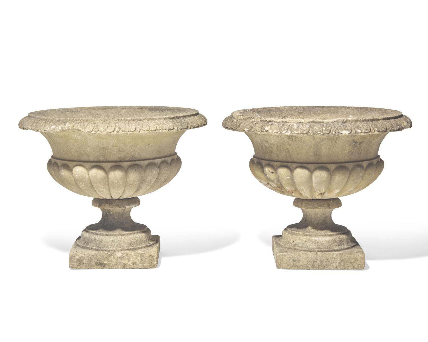 A pair of cast stone / concrete garden urns, 20th century
