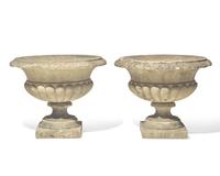 A pair of cast stone / concrete garden urns, 20th century