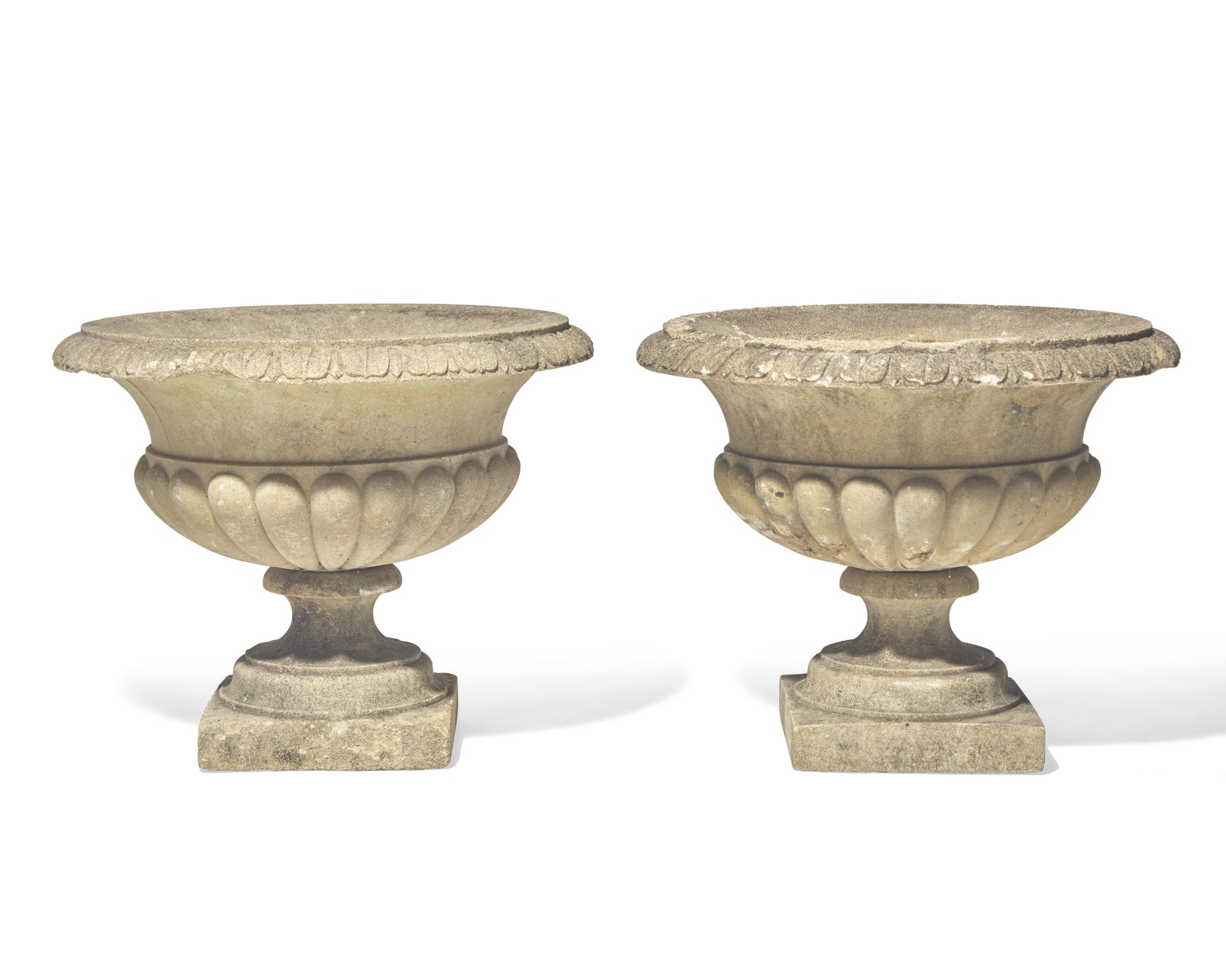A pair of cast stone / concrete garden urns, 20th century