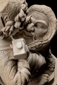 An Italian Marble Figure of a Young Sculptor