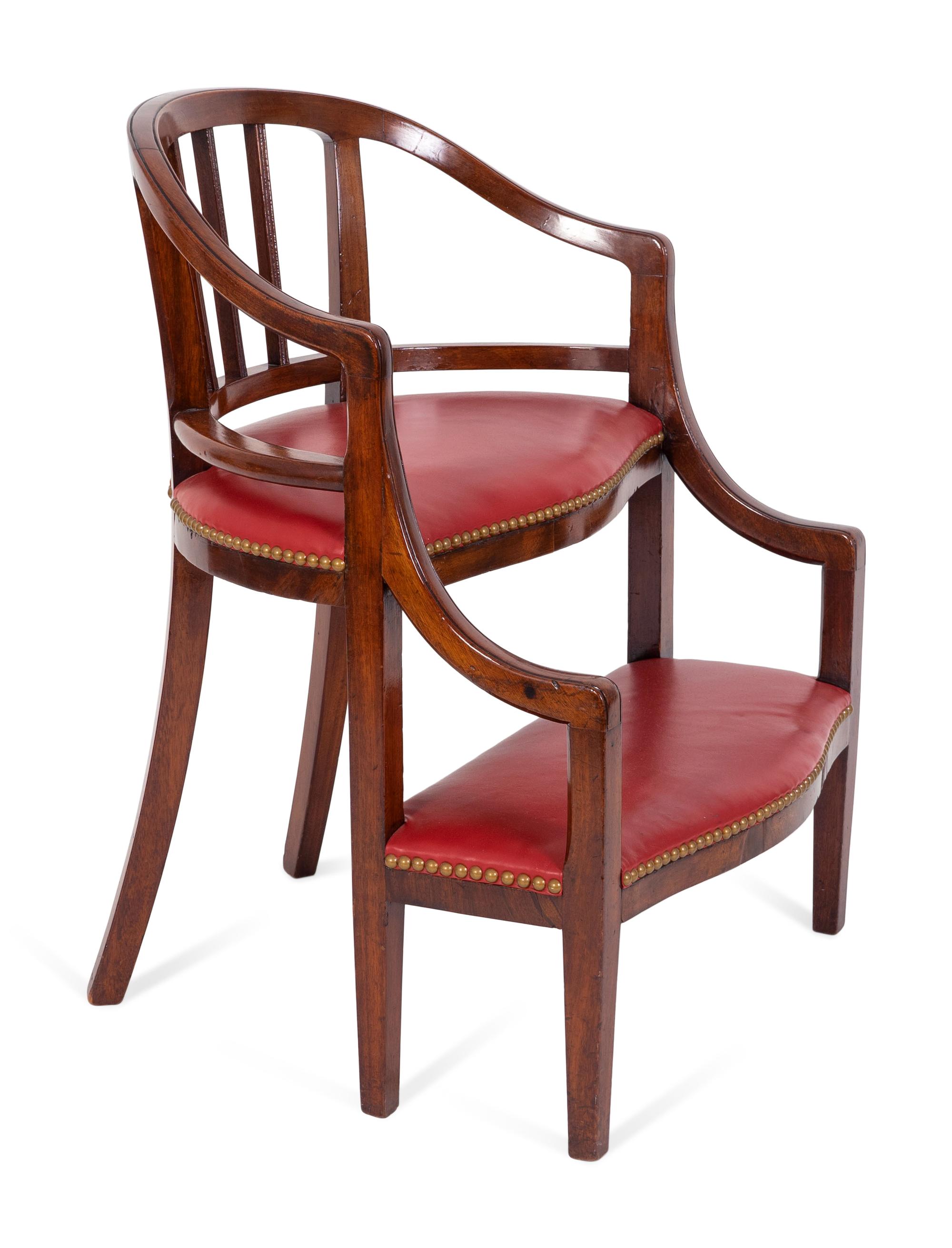 A Georgian Style Mahogany and Red Leatherette Library Chair — 20TH CENTURY