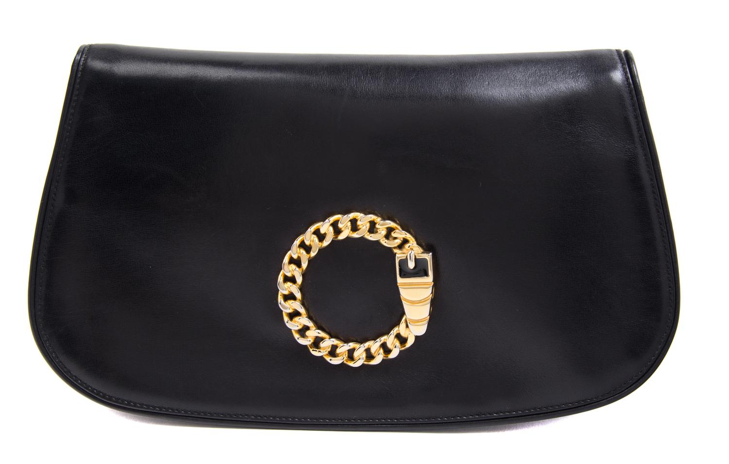 A Mark Cross Black Leather Clutch, 11" x 6.5" x 1".