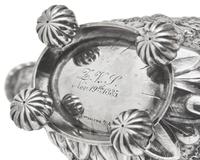 An Assembled American Eight-Piece Repoussé Silver Tea and Coffee Service