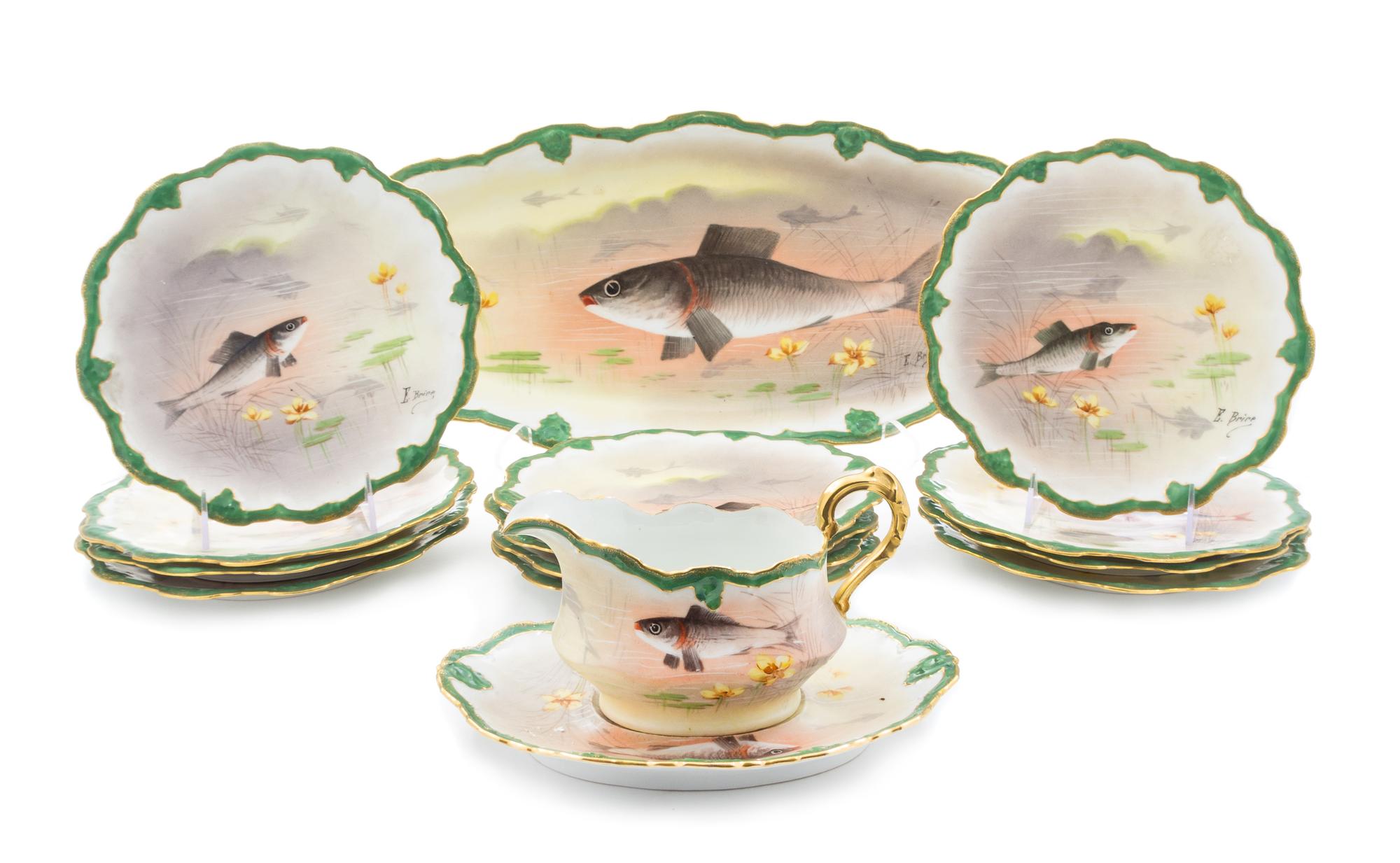 A Limoges Porcelain Fish Service Width of platter 23 1/2 inches.