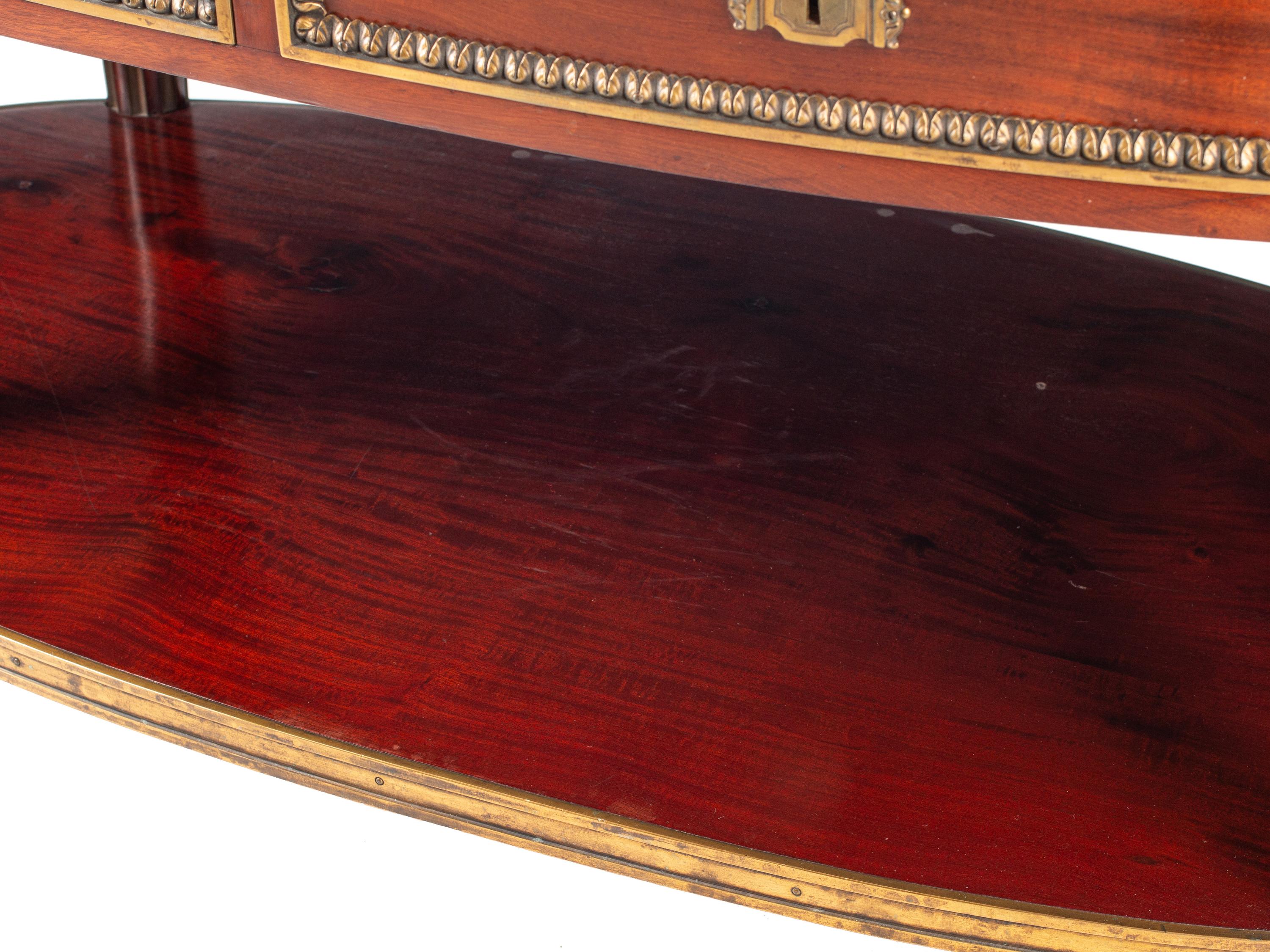 A Louis XVI Style Gilt Bronze Mounted Mahogany Marble-Top Console Desserte