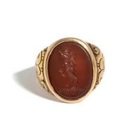 A Neoclassical Gold and Carnelian Finger Ring with the God Eros Riding a Satyr