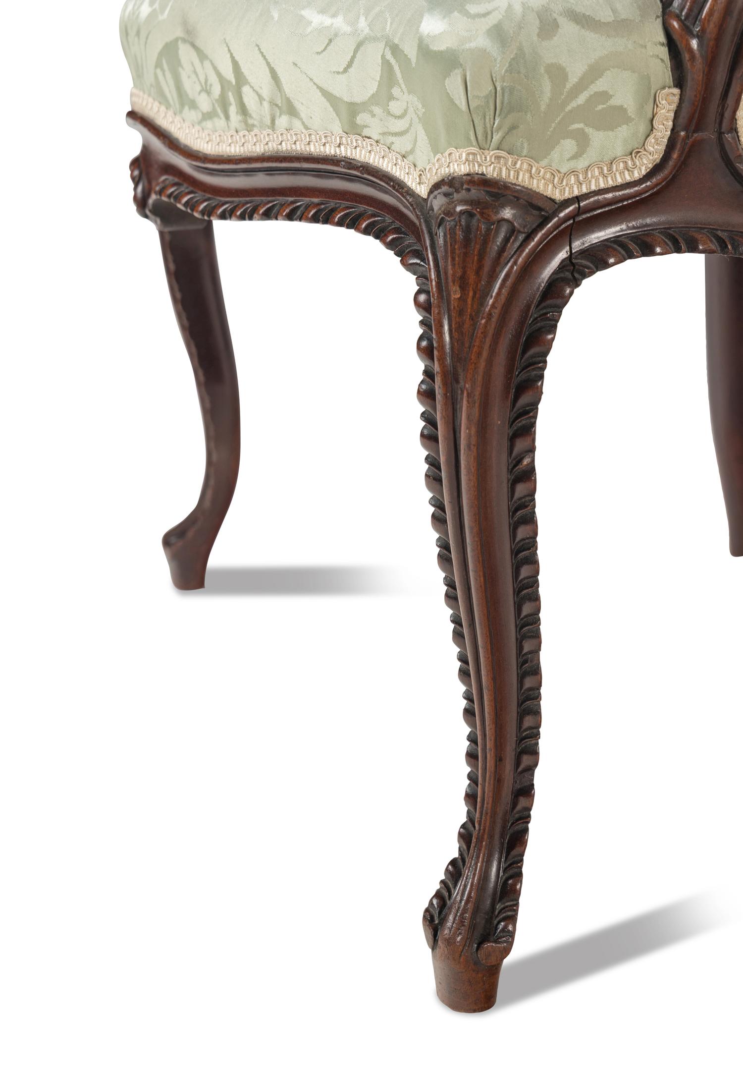 A Pair of George III Solid Mahogany Armchairs
