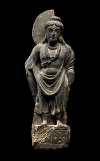 A Gandharan Grey Schist Figure of Maitreya