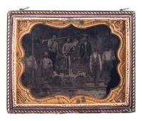 [EARLY PHOTOGRAPHY]. Quarter plate tintype of a group of railroad workers, incl. African American and white subjects.