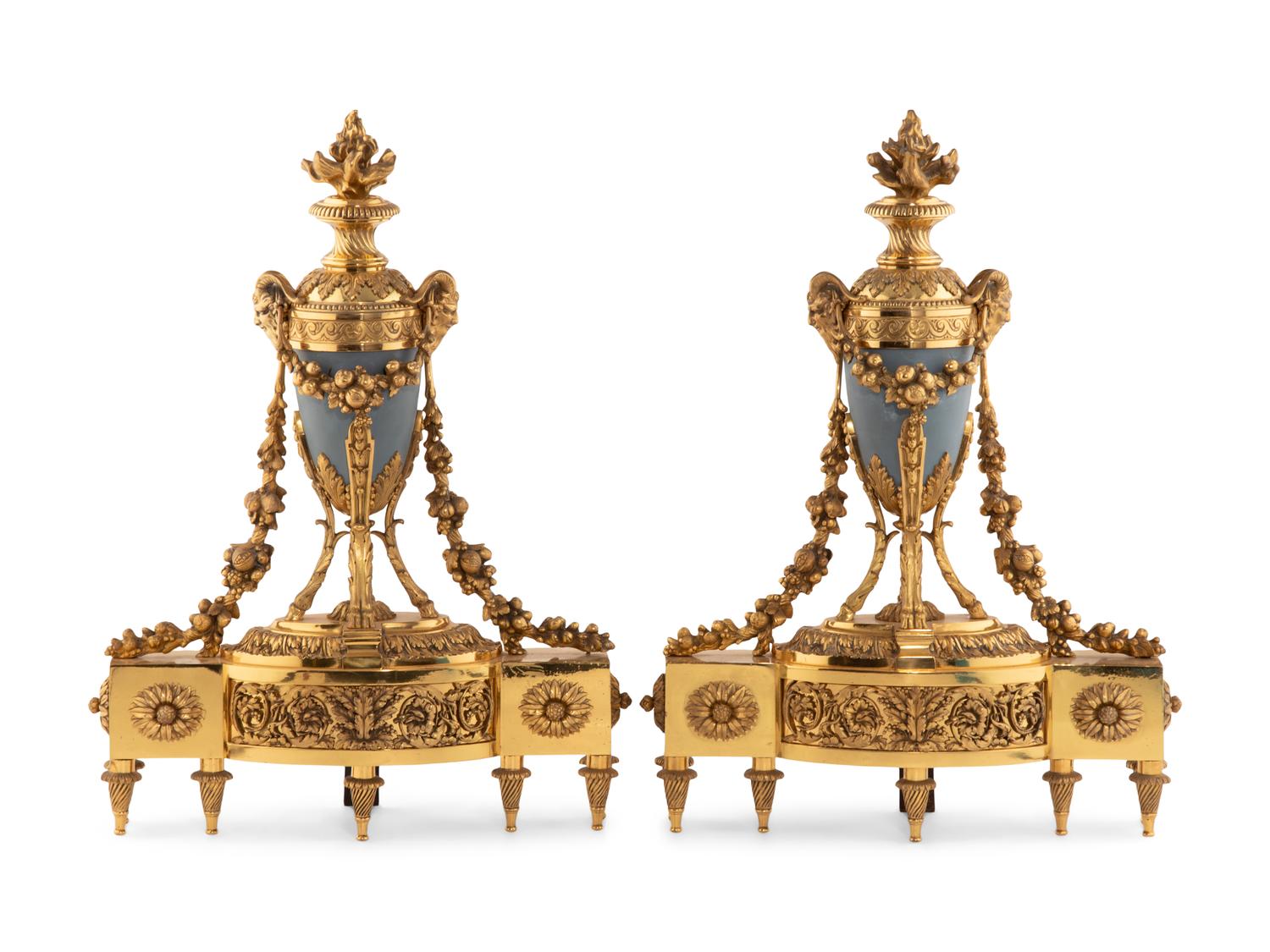 A Pair of French Gilt Bronze and Painted Tole Chenets