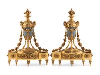 A Pair of French Gilt Bronze and Painted Tole Chenets