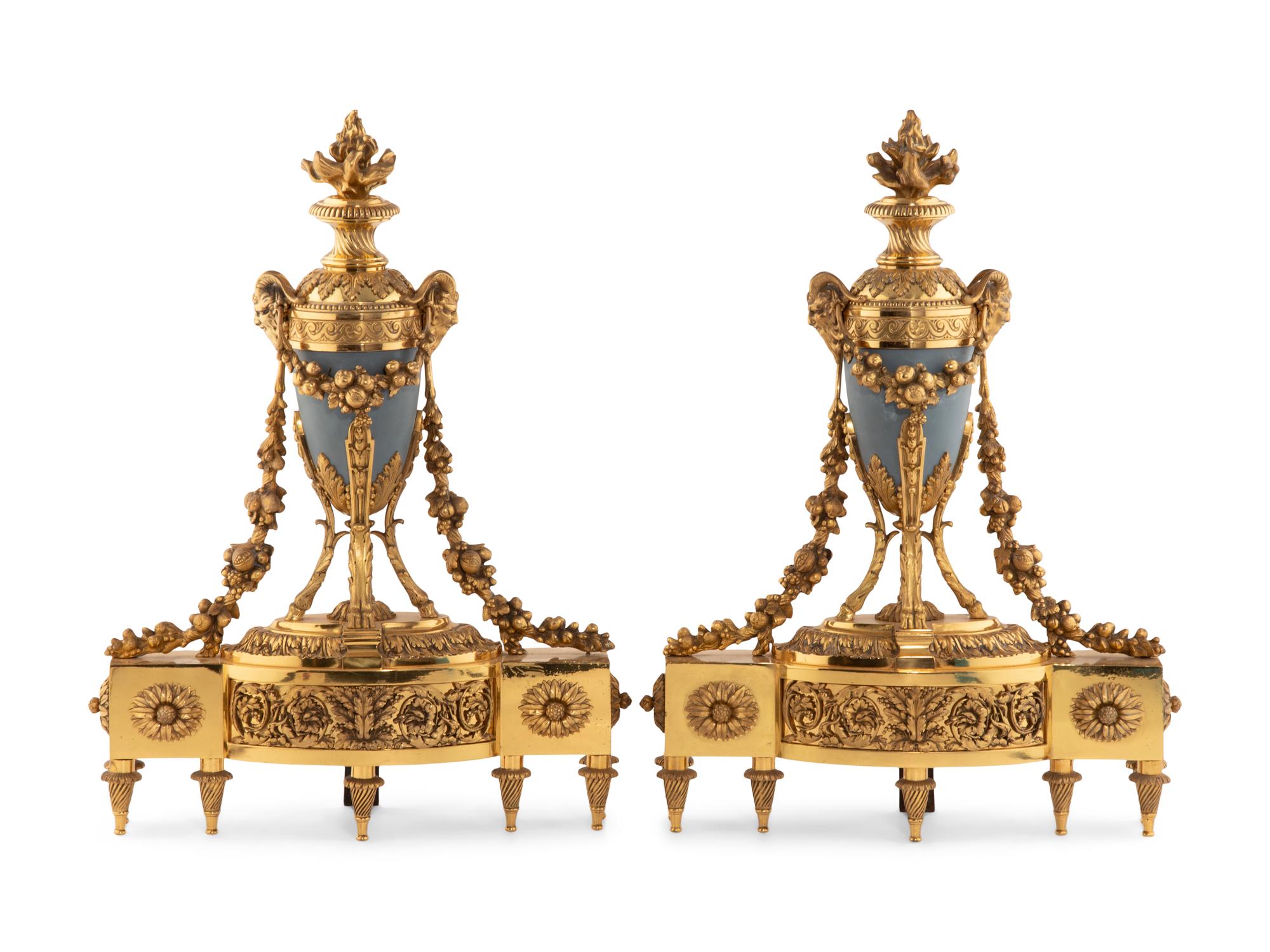 A Pair of French Gilt Bronze and Painted Tole Chenets