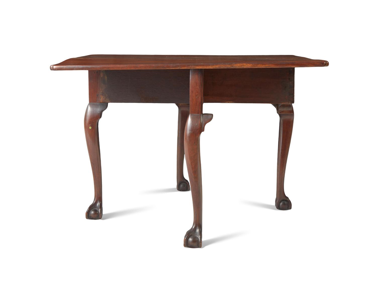 A Chippendale Carved and Figured Mahogany Drop-Leaf Dining Table, Philadelphia, PA, Circa 1775